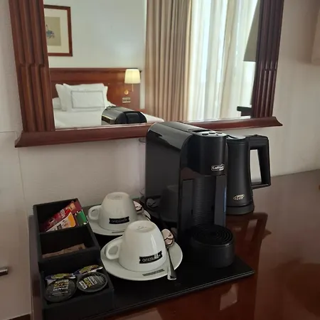 Melia Plaza Отель